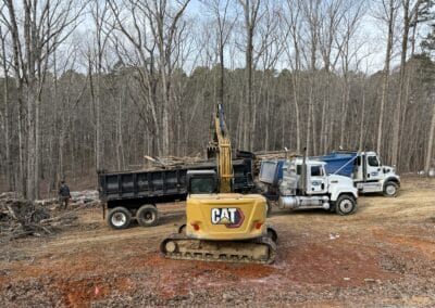 A dirt road with construction machinery
